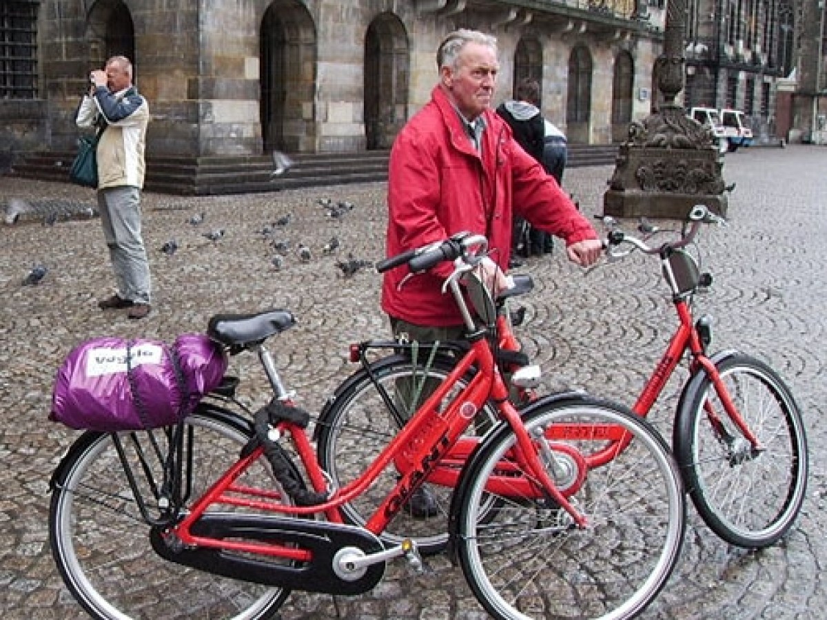 a person wearing a red bicycle